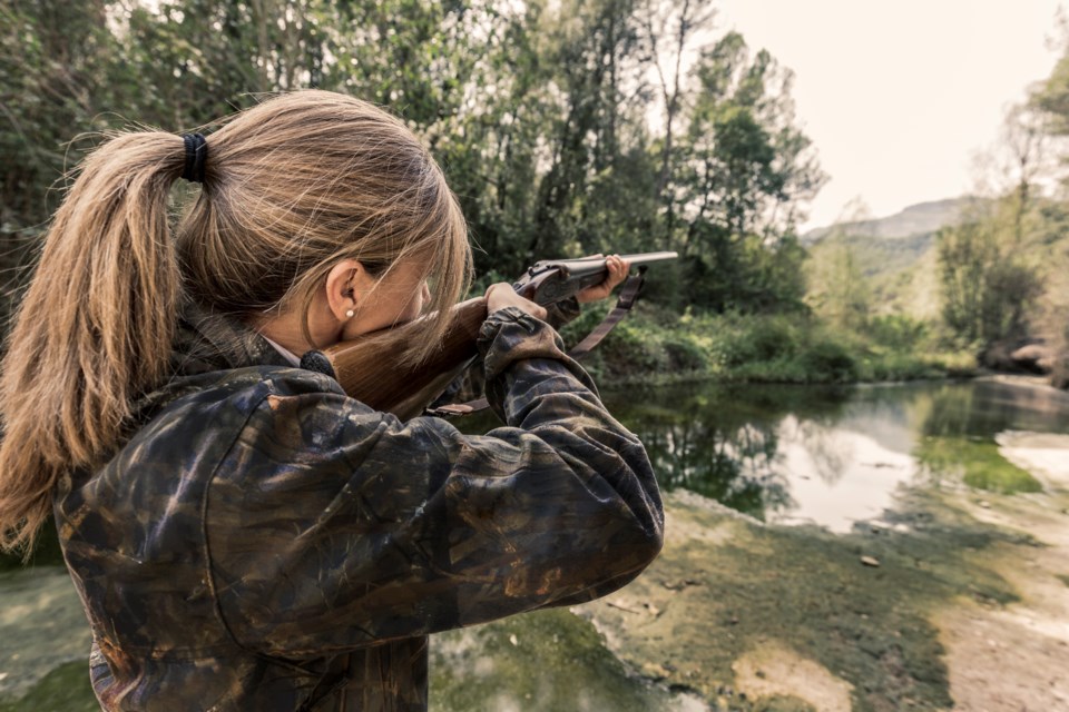 woman hunting rifle - Getty Images