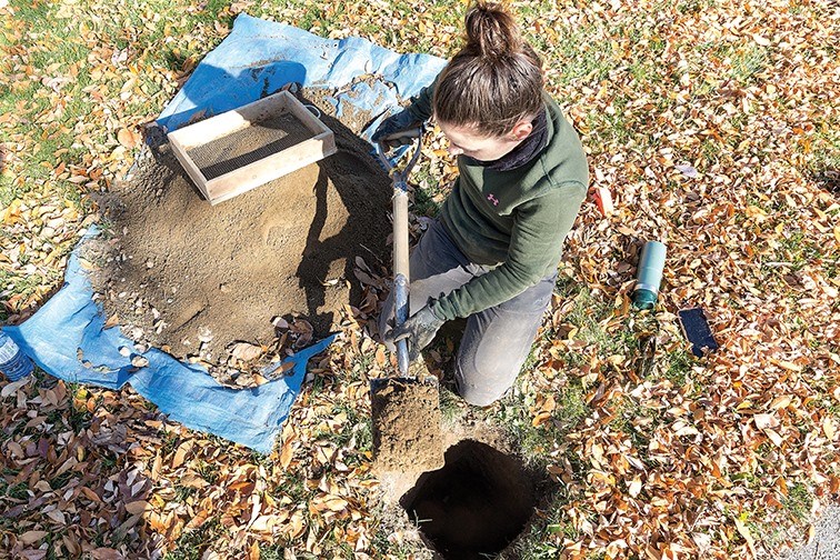 Elissa Gagnon, project lead and permit holder with ARCHER CRM Partnership, and member of the Lheidl T'enneh First Nation, works with members of The Exploration Place on Friday afternoon at Lheidli T'enneh Memorial Park during an archeological survey on the site of the proposed Lheidli T'enneh Daycare Centre. 