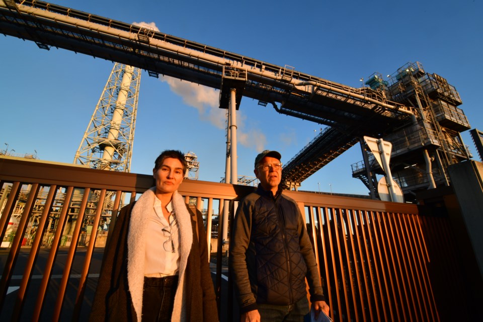 connolly-and-parfitt-in-front-of-a-pellet-plant-in-ishinomaki-japan_conservation-north-photo