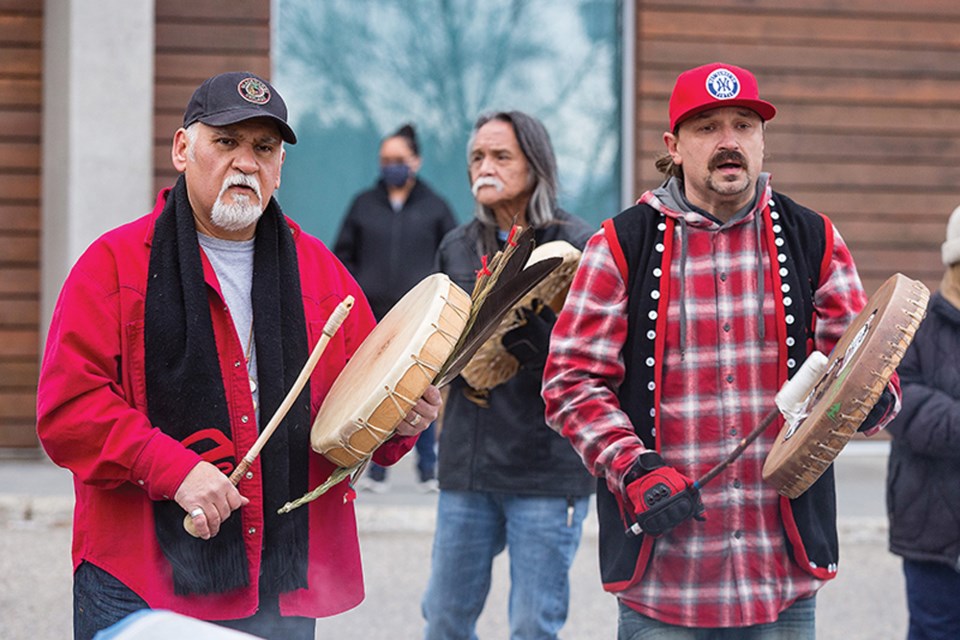 Wesley Mitchell, right, and Ivan Paquette, left, play the drums during a drumming ceremony at UHNBC recently.