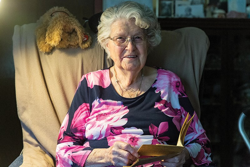 Doreen Denicola poses for a photo in her home on Sunday afternoon.