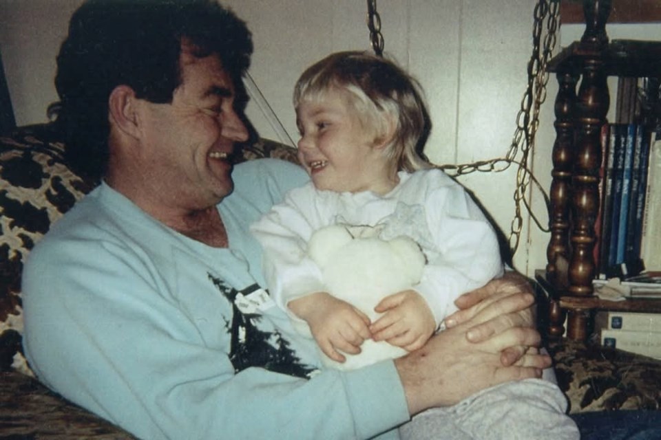 Doug and Loren Leslie share a tender moment together in their home on Fraser Lake. Doug died on March 15, 2025, 14 1/2 years after his daughter Loren was murdered by serial killer Cody Legebokoff.