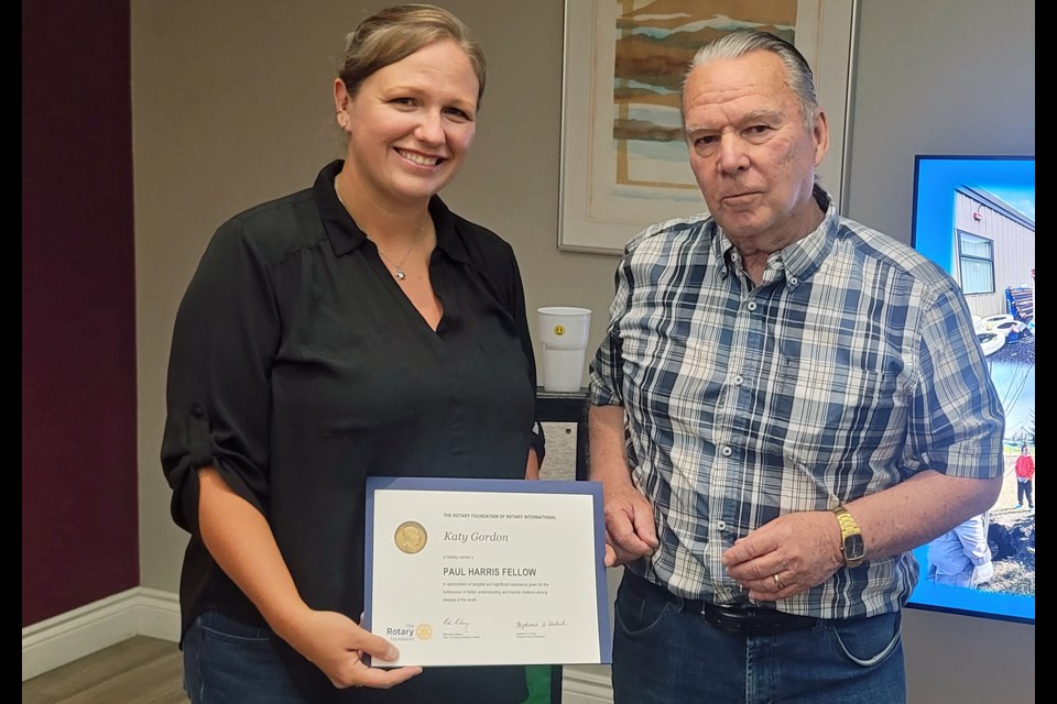 Prince George Fire Rescue firefighter Katie Gordon receives the Yellowhead Rotary Club's Paul Harris Fellow award at a luncheon at the Coast Inn of the North on Thursday, July 17, 2025.