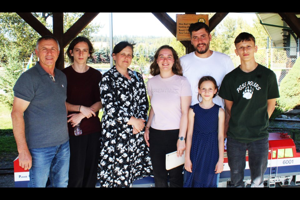Iryna and Vasyl Derunets, third and fourth from right, came to Canada in May 2022 to escape the war in Ukraine. in January, Vasyl's family came to join them. From left are Vasyl's father Serhii, 15-year-old brother Alexander, step-mother Iryna,  nine-year-old sister Alina and 14-year-old brother Alexander.
