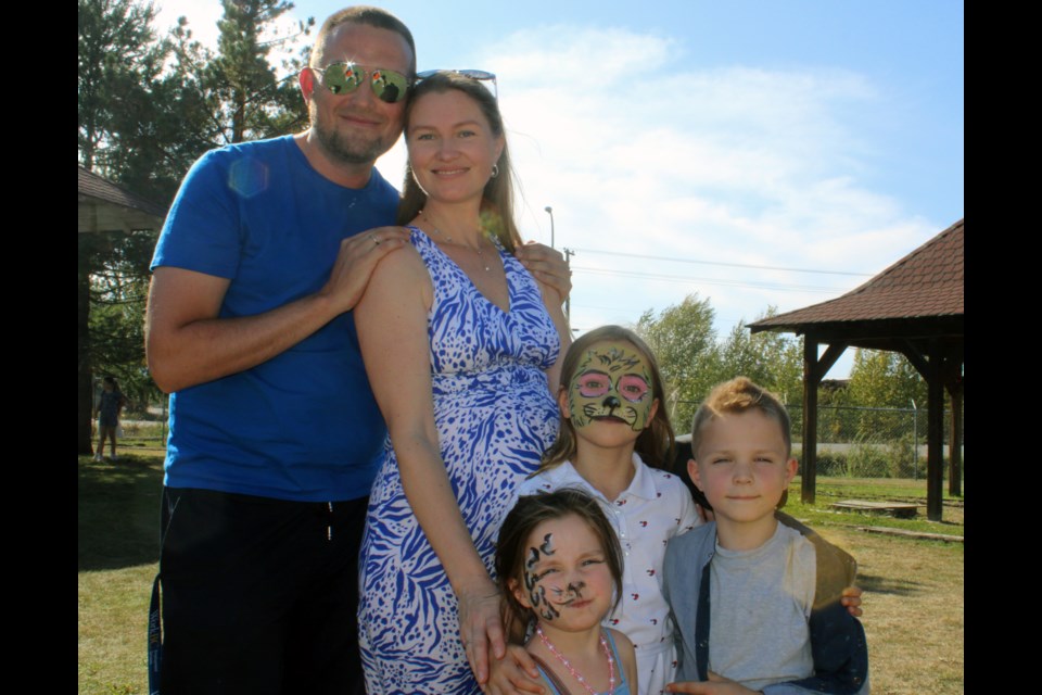 The Pluzhnikov family, from left, Michael, Krystina, Julie, Michelle and Leo.
