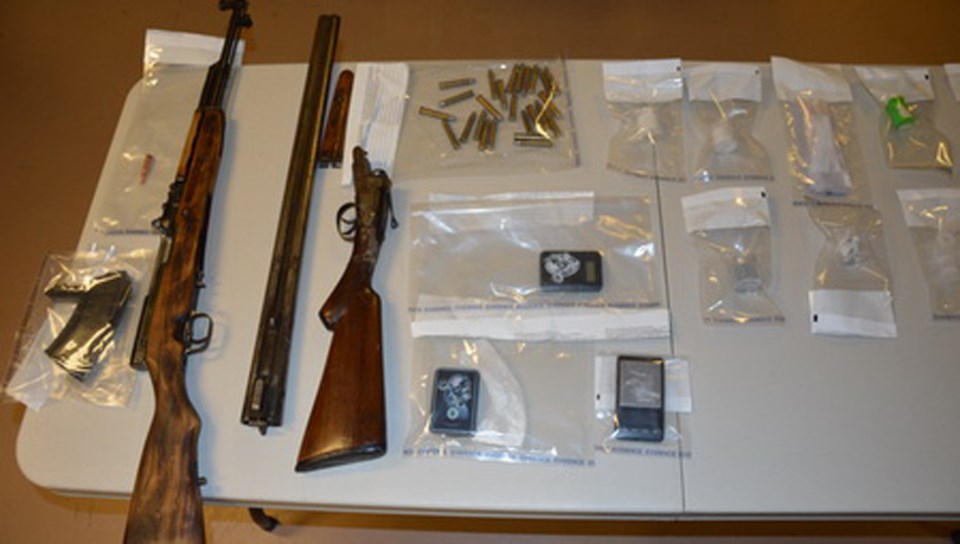 Drugs guns seized