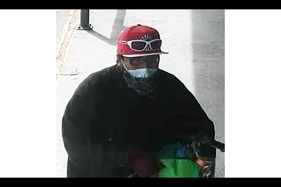 Prince George RCMP are seeking a suspect who sprayed bear spray at employees while robbing a store on Monday.