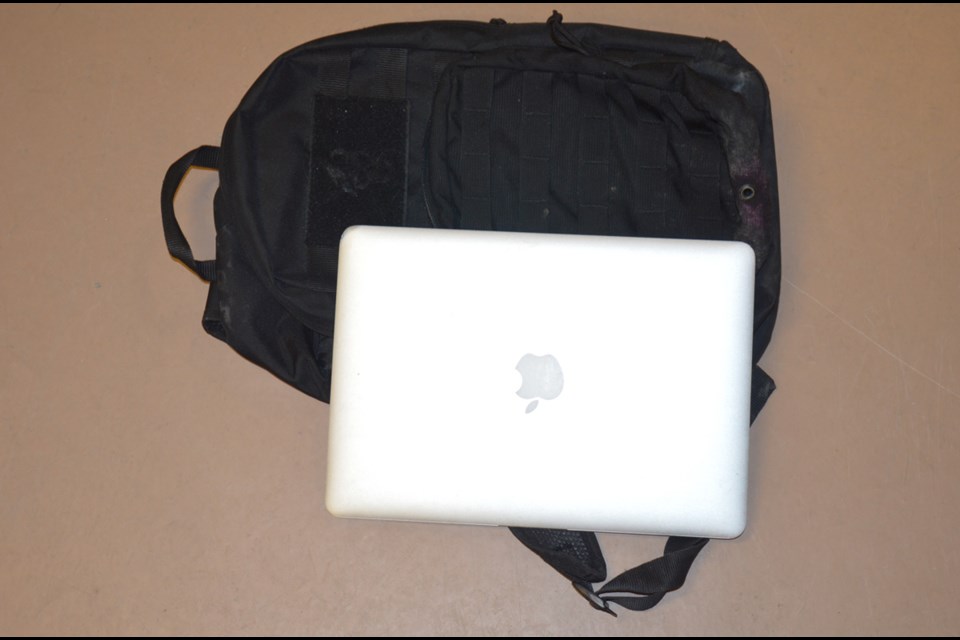 A MacBook Air laptop in a black backpack is one suspected stolen item police recovered during a traffic stop on Jan. 13.