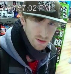 A suspect connected to the theft of a firearm from a Prince George convenience store is seen in an RCMP handout photo,