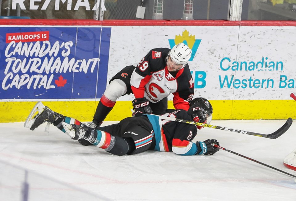 13 Cougars Majid Kaddoura takes care of Jake Lee May 9 2021