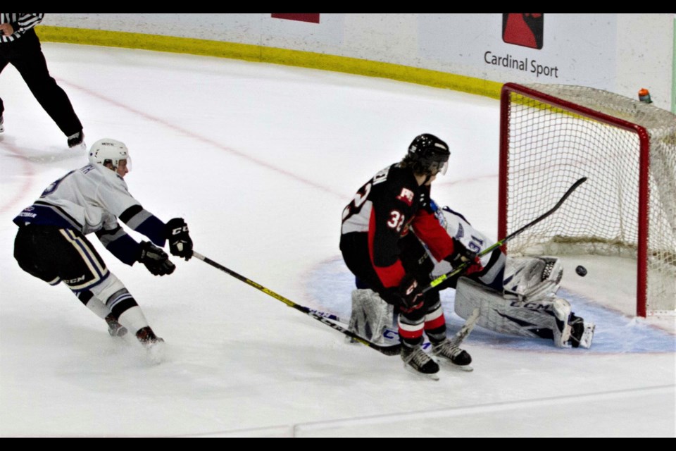 Prince George Cougars winger Fischer O'Brien is denied by Victoria Royals goalie Adam Evanoff on a breakaway chance late in the first period Saturday in the WHL hub in Kelowna. Evanoff made 33 saves in a 2-1 win over the Cats.