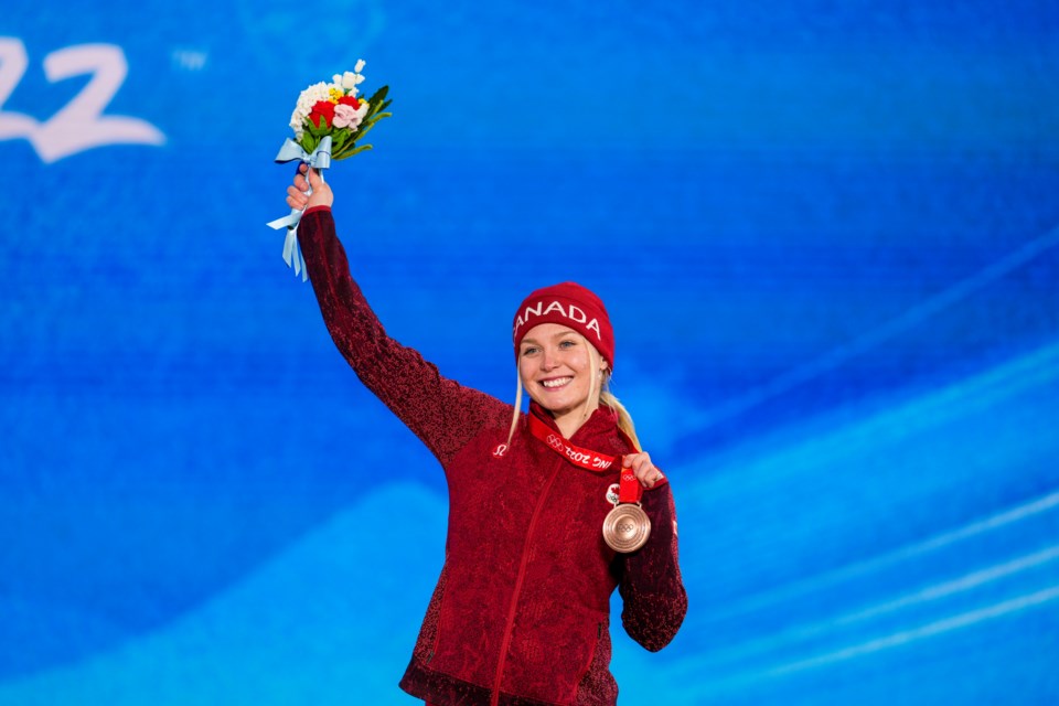 Meryeta O'Dine of Prince George is all smiles after she received her bronze medal for the individual snowboard cross event at the Beijing Olympics.