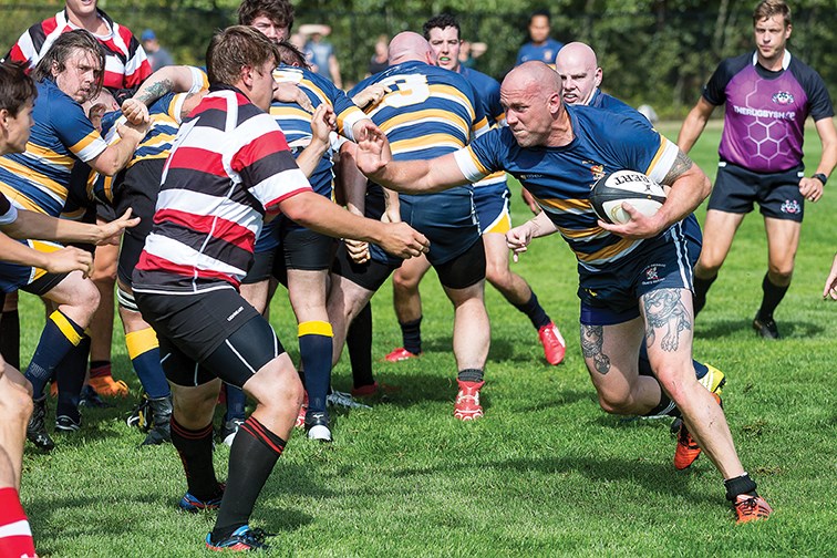 Citizen Photo by James Doyle/Local Journalism Initiative. The Prince George Gnats (blue/yellow) took on the Williams Lake Rustlers (red/black) on Saturday morning at the lower PGSS fields in Central Interior Rugby Union league action.