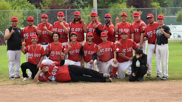 The LTN Contracting Reds, also known as Big Guy Lake, celebrate their 5-4 win over the Decorum Painting Angels Sunday in the final of the Spruce City Men's Fastball Icebreaker Tournament at Spruce City Stadium.