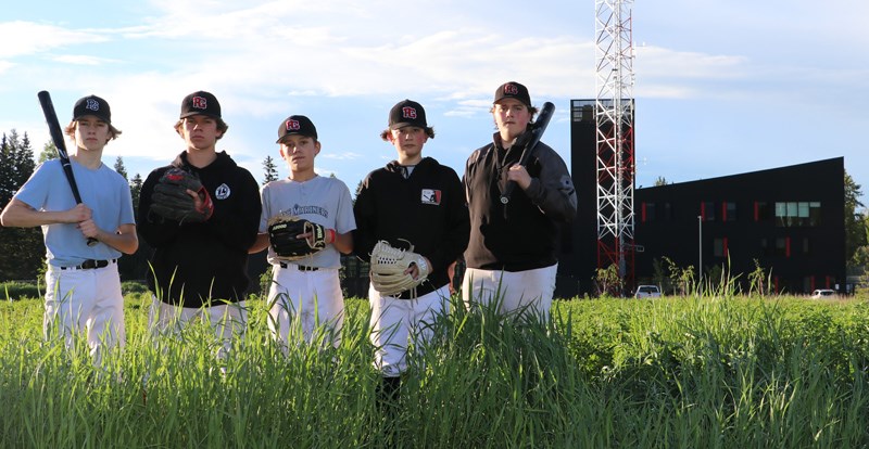 PGYBA 15U players stand in the spot where Carrie Jane Gray ball field used to be located. 