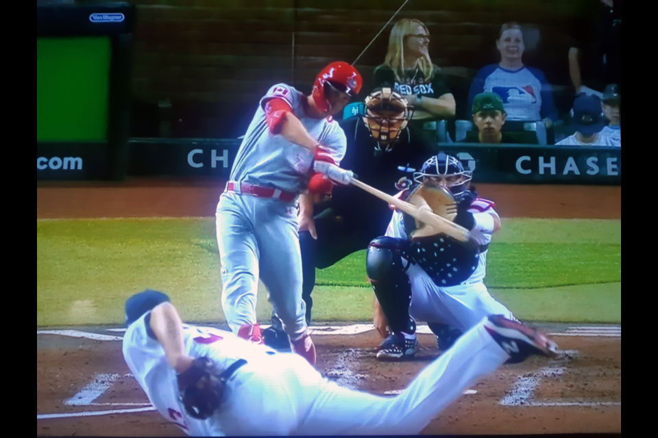 Jared Young of Prince George connects on a home run off pitcher Lance Lynn to lead off the second inning Monday at the World Baseball Classic in Phoenix, Ariz. That was the only run for Canada in a 12-1 loss to the United States.