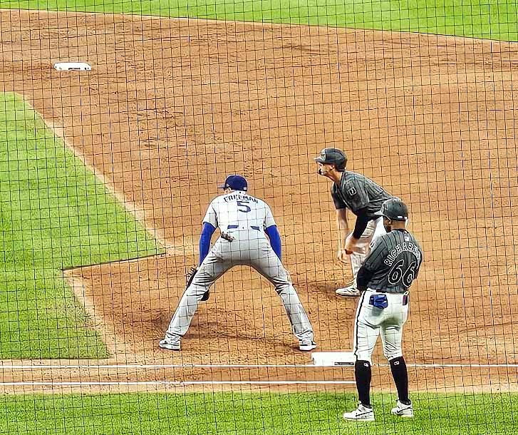 Jared Young of the New York Mets got on base on his first at-bat on Saturday (May 24, 2025) since getting called up from triple-AB Syuracuse. Standiung next to Young is Los Anghelese Dodgers first baseman Freddie Freeman. The two were teammates playing for Canada in the 2023 World Baseball Classic.