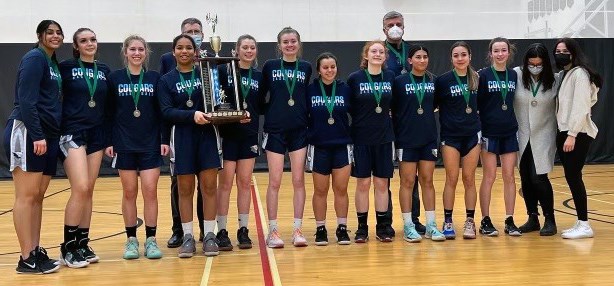 The College Heights Cougars celebrate their North Central zone triple-A girls championship.