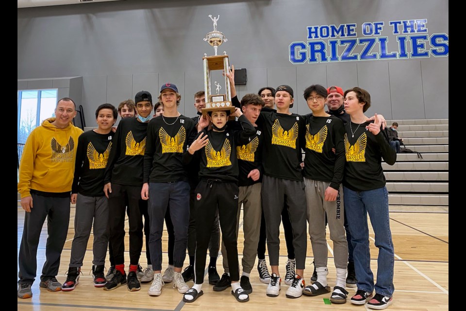 The Duchess Park Condors celebrate their North Cenral zone junior A boys basketball championship after they defeated the Prince George Polars 63-54 in the A-final at Shas Ti Kelly Road gym.