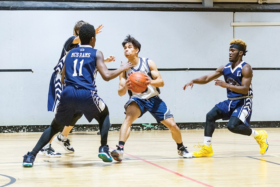 Citizen Photo by James Doyle. Cedars Christian School Eagles took on the Mountain Christian School Rams on Thursday night at PG Dome in North Central Single-A Zone basketball action.