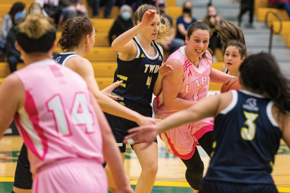 Citizen Photo by James Doyle. UNBC Timberwolves forward Svetlana Boykova drives to the net through traffic against the Trinity Western Spartans on Saturday afternoon at Northern Sport Centre.