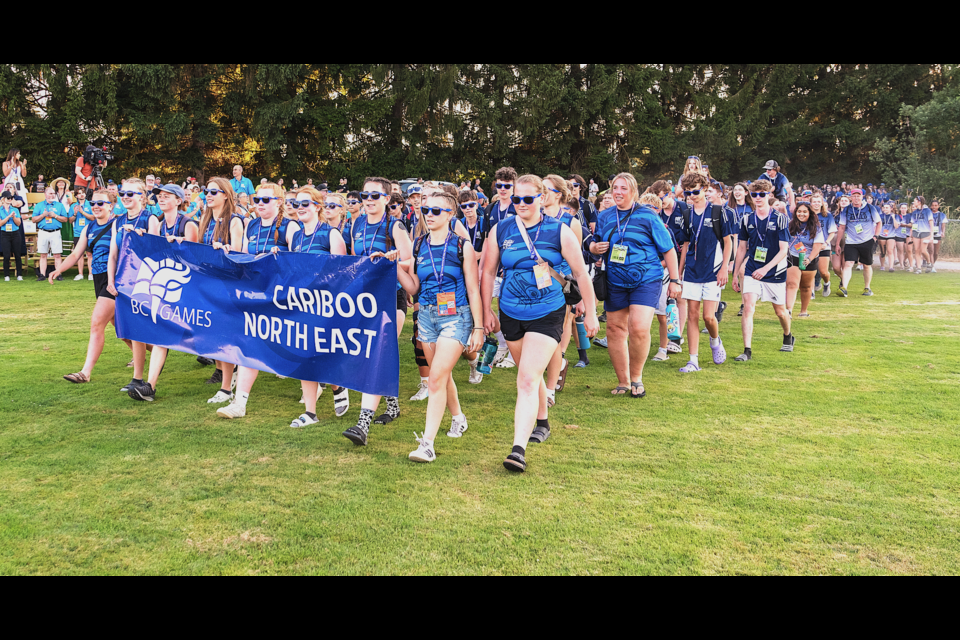 Athletes from Zone 8 Cariboo-Northeast, a team that includes 156 from Prince George, walk out for the opening ceremonies Thursday night at the BC Summer Games in Maple Ridge.