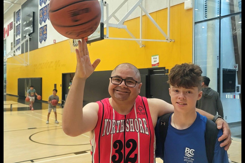 Nick Kellof, 45, and his 14-year-old son Sam are playing basketball together this weekend with the North Shore Wildcats at the Special Olympics BC Summer Games. The Wildcats lost two close games to drop to 0-3 on Friday, July 11, 2025 at Duchess Park Secondary School. The eight-team tournament wraps up Saturday. 