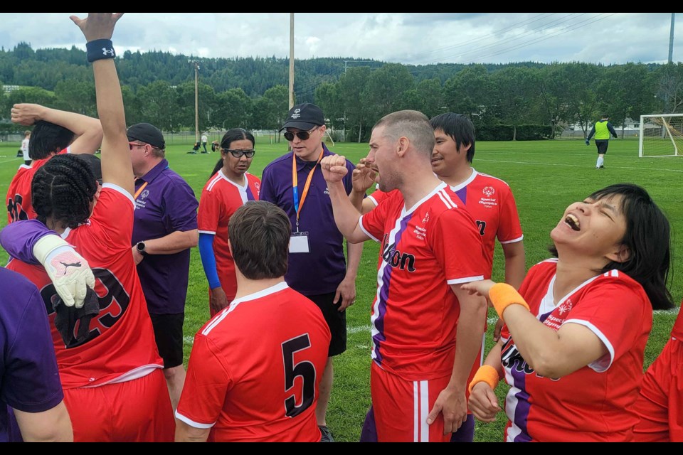 Team Yukon gets revved up for the second half of their Special Olympics BC Summer Games semifinal game against Victoria with a team cheer on the sideline at Rotary Soccer Field on Saturday, July 12, 2025.