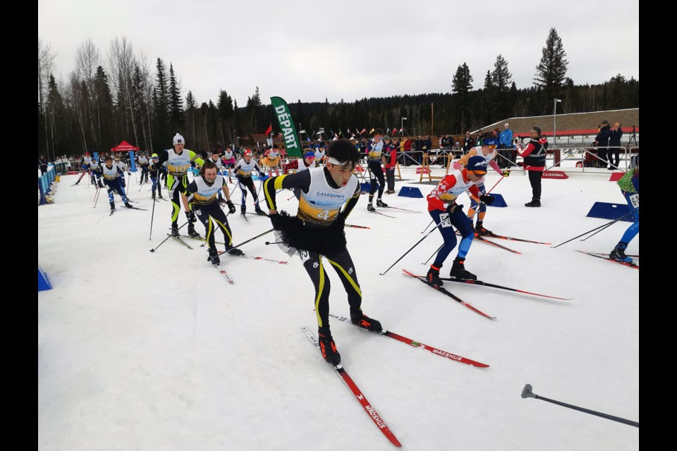Thomas Hengel (4) of Hinton Nordic Ski Club has a determined look as he heads out of the start gate for the senior boys/senior girls single mixed relay Thursday at the Canadian biathlon championships at Otway Nordic Centre.