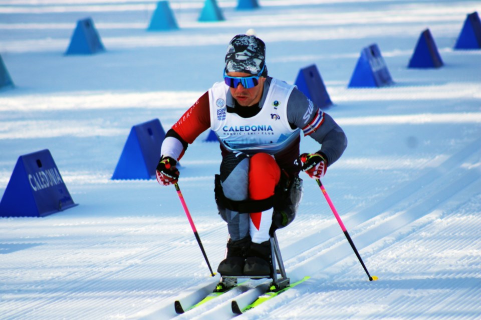 Derek Zaplotinsky of Smoky Lake, Alta., digs in his poles at the start of his race in the men's sit-ski 7.5-km event at the Para Biathlon World Championships.