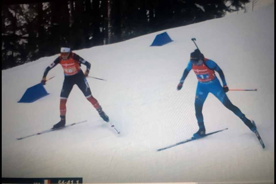 Emily Dickson of Burns Lake (left) gets lapped by race leader Julia Simon of France during Friday's World Cup biathlon women's relay in Rhupolding, Germany. Canada was forced to retire from the race at that point, with anchor skier Sarah Beaudry of Prince George still waiting for the tag in the exchange area. Beaudry did not get to race and Canada finished 22nd out of 23 teams.