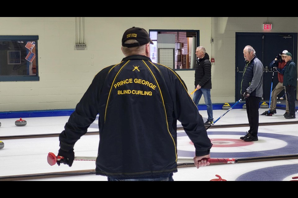 Terry Pipkey, Prince George Blind Curling team lead, stands at the ready during a recent practice at the Prince George Golf & Curling Club.