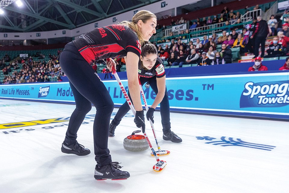 Citizen Photo by James Doyle. Team Canada lead Briane Meilleur, left, and second Shannon Birchard sweep at CN Centre on Saturday afternoon during the first draw of action at the 2022 BKT Tires and OK Tire World Women's Curling Championship.