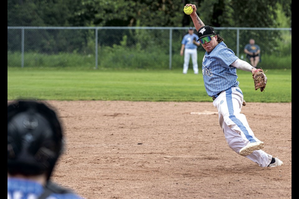 Bryden Lessard of the Nak'azdli Hummingbirds whips in a pitch to the plate against the Big Guy Lake Reds in an open division game last year at the John Cho Cup fastball tournament at Spruce City Stadium.