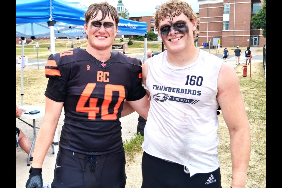 Shas Ti Kelly Road Roadrunner high school football alumni Bennett Switzer, left, and Kobe Kidd show their Prince George pride after playing in the Football Canada Cup for Team BC in Antigonish, N.S. The 10-day event ran from July 12-20, 2025.