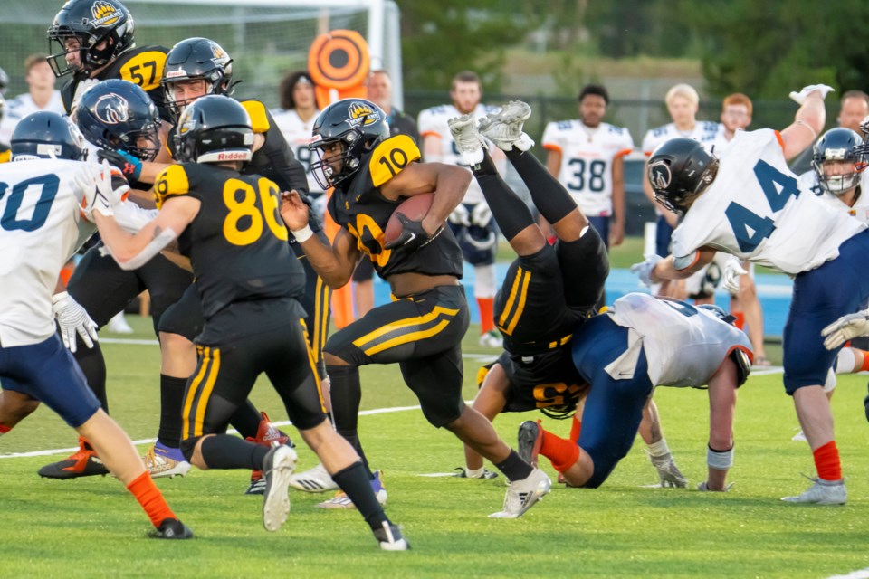 Broncos ball carrier Keanu Brown takes off