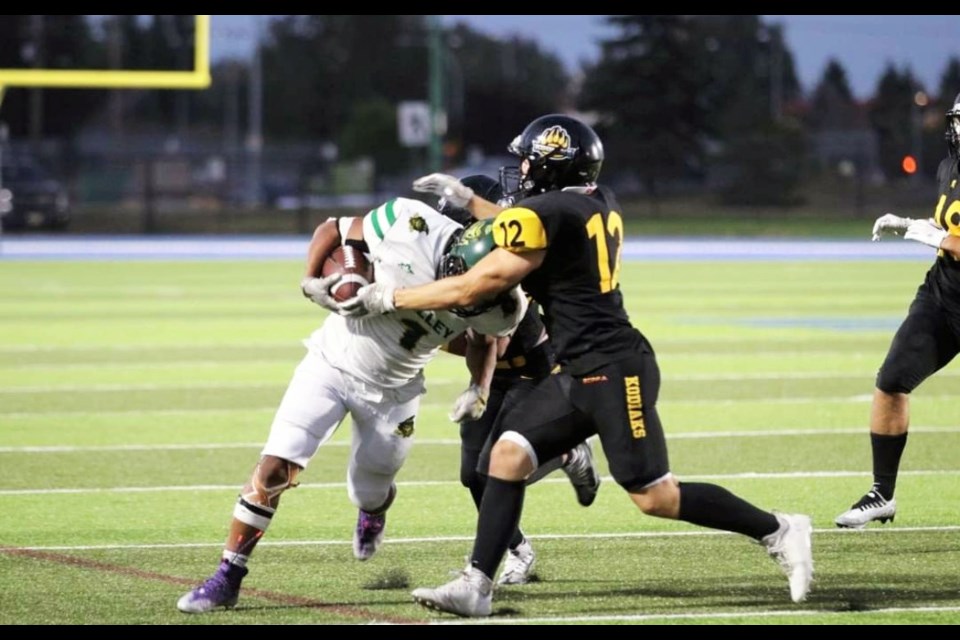 Prince George Kodiaks defensive back Hayden Matheson tackles a Valley Huskers ball carrier during a BCFC game last season.