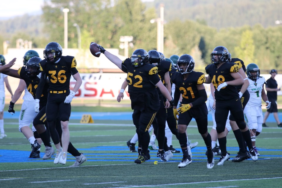 Prince George Kodiaks defensive lineman Corbin Brown (52) comes up with the ball after teammate Marcellus Pope forced a fumble in the second quarter of Saturday's game against the Valley Huskers at Masich Place Stadium. The Kodiaks went on to record their first-ever win, beating the Huskers 28-20.