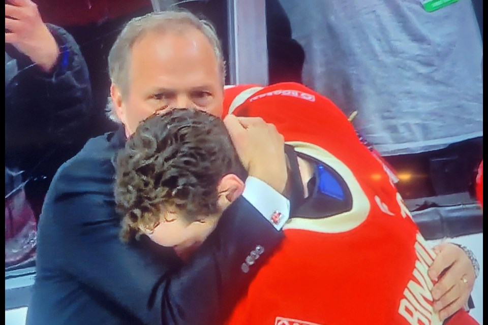 Prince George native and Team Canada head coach Jon Cooper congratulates his goalie, Jordan Binnington, after he made 31 saves in Canada's 3-2 overtime win over the United States in the championship game of the 4 Nations Face-Off Thursday in Boston. 