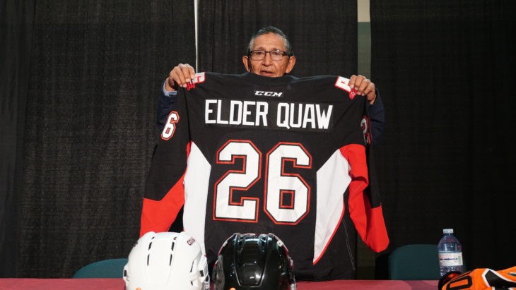 Lheidli T'enneh First Nation elder Clifford Quaw, a survivor of the Lejac residential school near Fraser Lake, holds up his commemorative Prince George Cougars jersey at a presentation Friday at CN Centre.                  