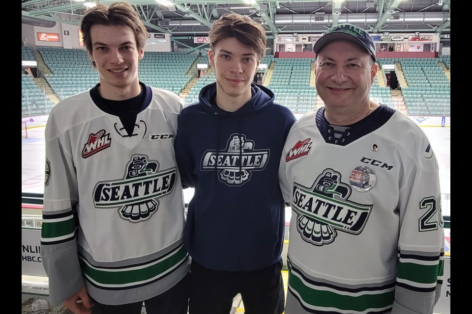 Marco Myatovic, left, gathers with his sons Markus, left, and Nico, centre, after Nico's Seattle Thunderbirds completed a four-game playoff sweep over the Prince George Cougars with an 8-2 win in Game 4 at CN Centre April 19, 2023. Marco died at age 58 at his Prince George home last week.