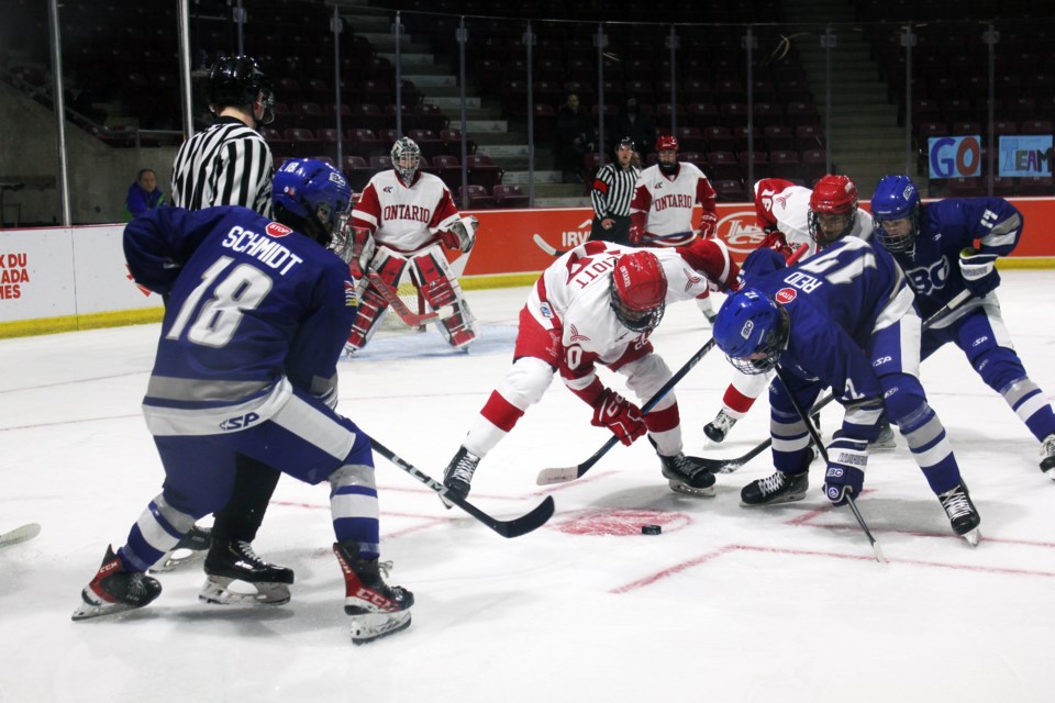 Cameron Schmidt of Prince George (No. 18, with back to camera), competes for Team BC in Sunday's game against Ontario at the Canada Winter Games. On Thursday Schmidt scored two goals and drew an assist in a 4-2 quarterfinal win over Manitoba  that put B.C. into the semfinals against Ontario on Friday.