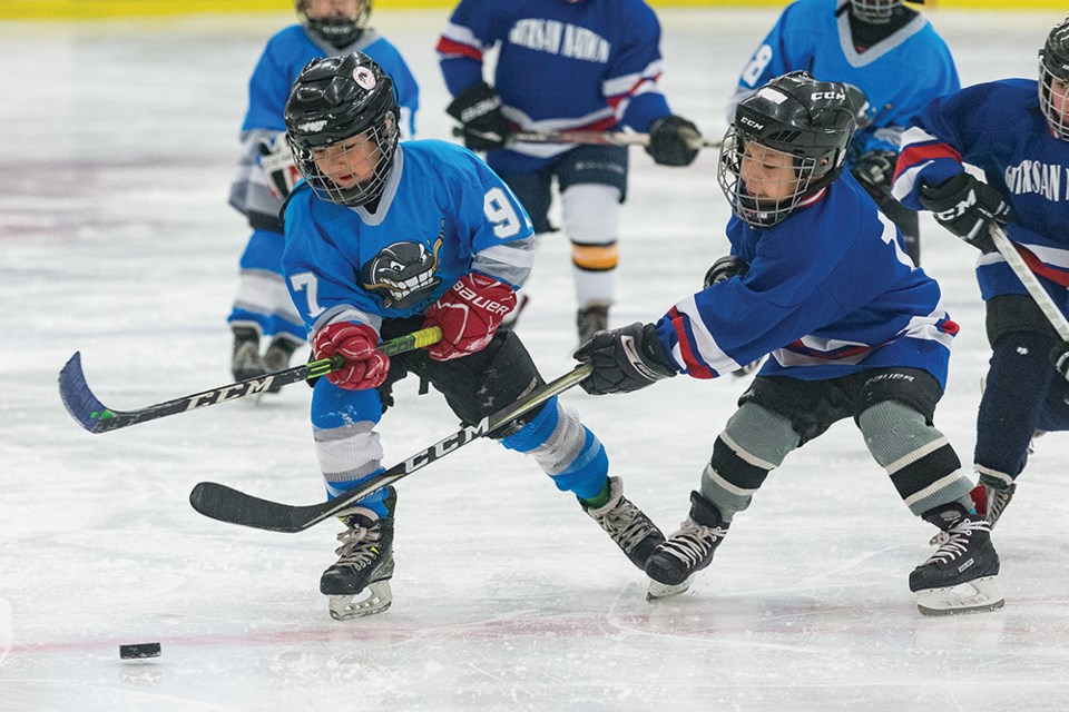 Citizen Photo by James Doyle. The Takla Lakers (light blue) took on the Gitxsan Nation Mini Northwests on Friday afternoon in Kin 1 in U9 action at the 24th Annual Prince George Aboriginal Youth Hockey Championships.