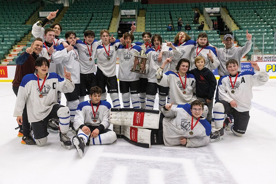 Citizen Photo by James Doyle. Northland Water and Sewer Services pose for a team photo with their trophy on Thursday evening in CN Centre after winning the PGMHA U18 Recreational championship final.