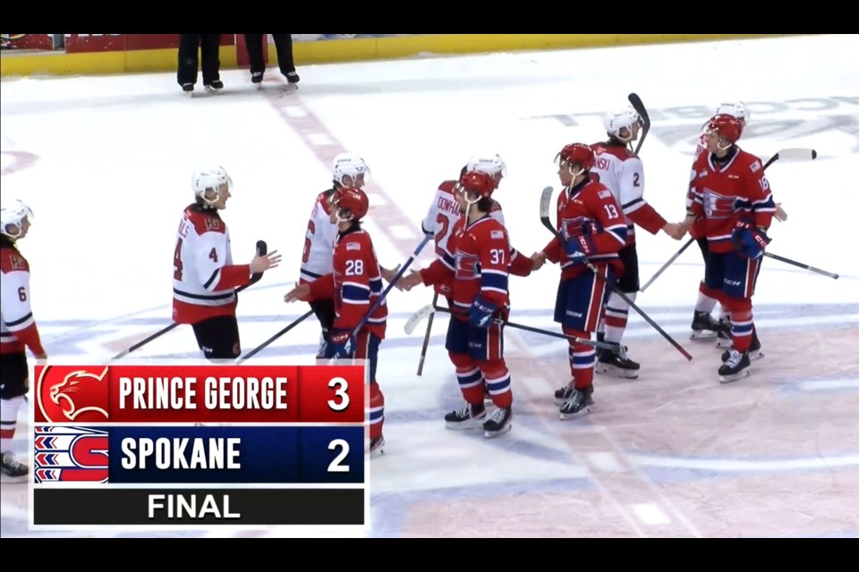 The Prince George Cougars shake hands with the Spokane Chiefs after they beat them 3-2 Wednesday in Spokane to complete their first-round series sweep.