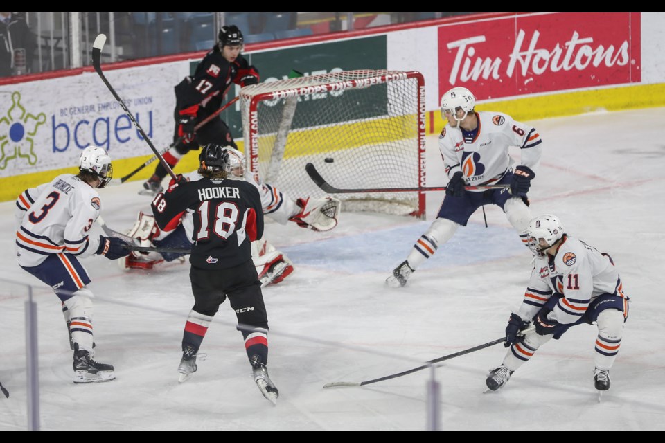Cougars centre Jonny Hooker scores the game-winning goal 8:23 into the third period Friday night in Kamloops.