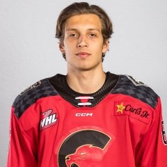 Prince George Cougars 20-year-old defenceman Viliam Kmec was completed a Gordie Howe hat trick with a goal, an assist and an fight to lead the Cougars to a 4-3 win over the visiting Kelowna Rockets Friday at CN Centre.