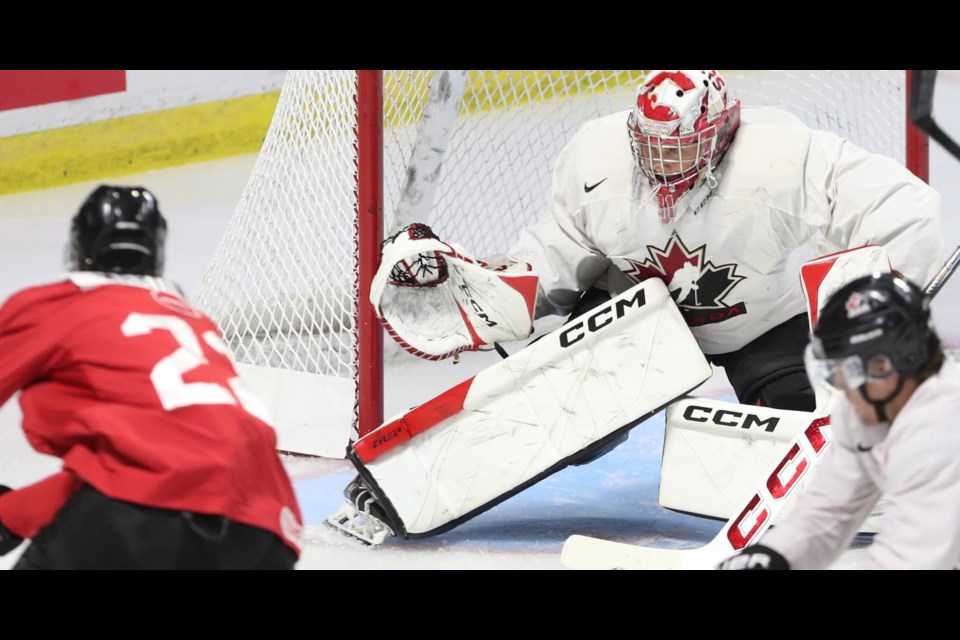 Josh Ravensbergen makes one of his 18 saves for Canada White in an intrasquad game against Canada Red Tuesday in Windsor, Ont.