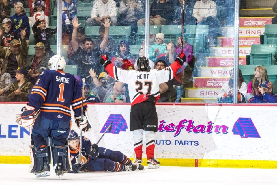 Riley Heidt celebrates a goal in the Cougars' final regular season game of the 2022-23 season, which ended up a 3-2 shootout win over the Kamloops Blazers.