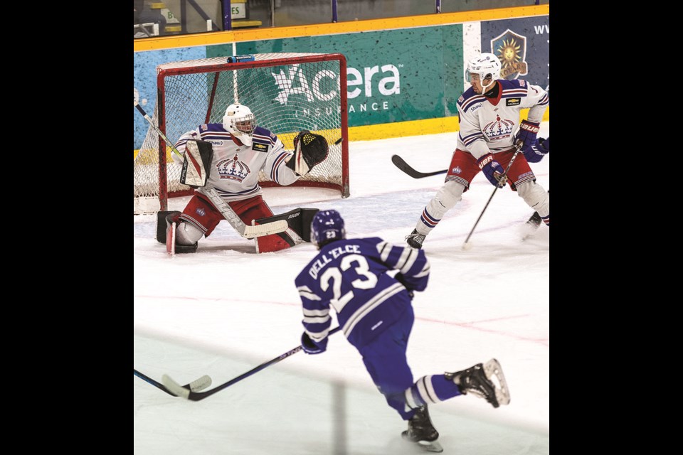 Spruce Kings goalie Ryder Green deflects a shot from Penticton Vees defenceman Francesco Dell'Elce as Kings defenceman Kai Greaves looks on during first-period action in Game 4 of their first round series at Kopar Memorial Arena Wednesday.


Citizen photo by Chuck Nisbett